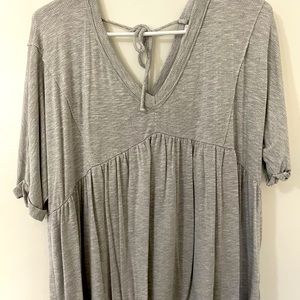 Shortsleeved peplum top tie back never worn